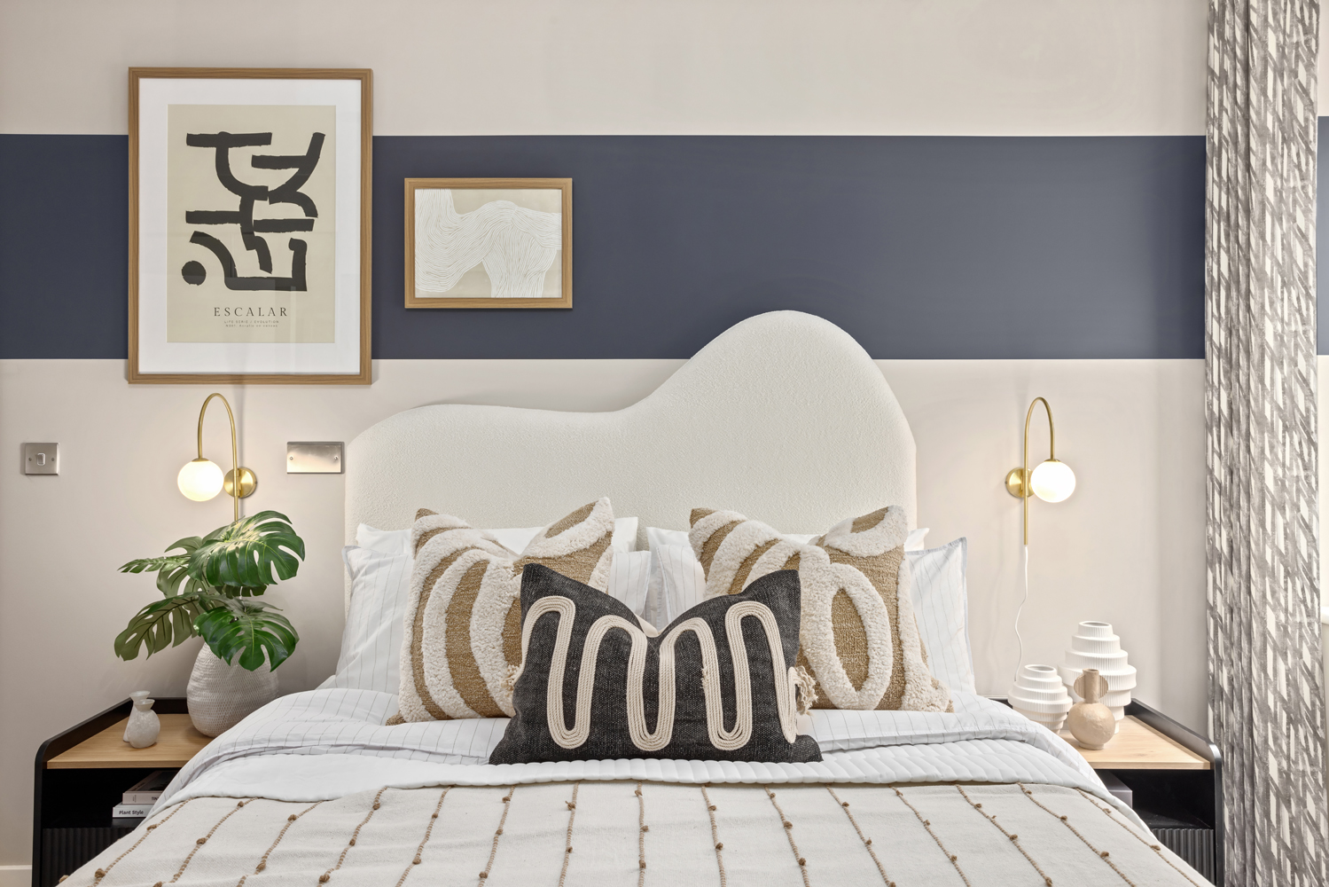 A spacious bedroom with built-in wardrobe with big floor to ceiling window and en-suite