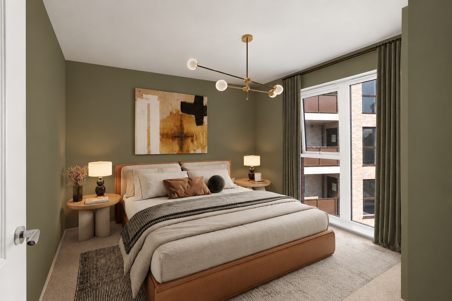 Bedroom with olive green walls and a double bed with two side tables.