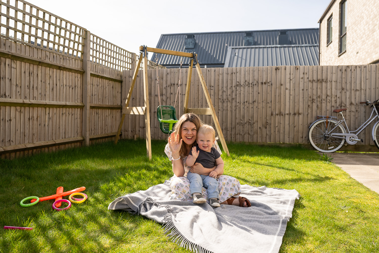 A mother and baby in the garden