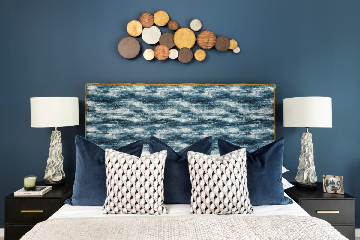 calming blue interiors in the master bedroom at brunel street works