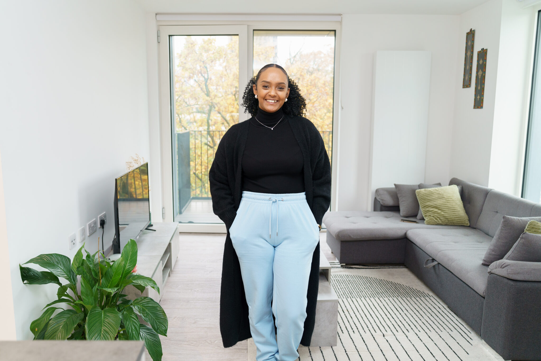 Merone in her living room