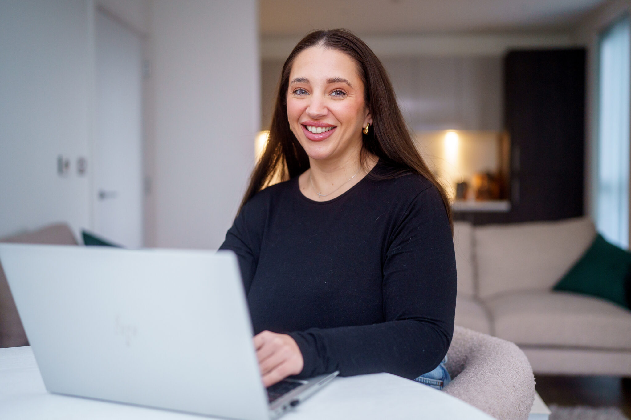 Jennifer using her laptop