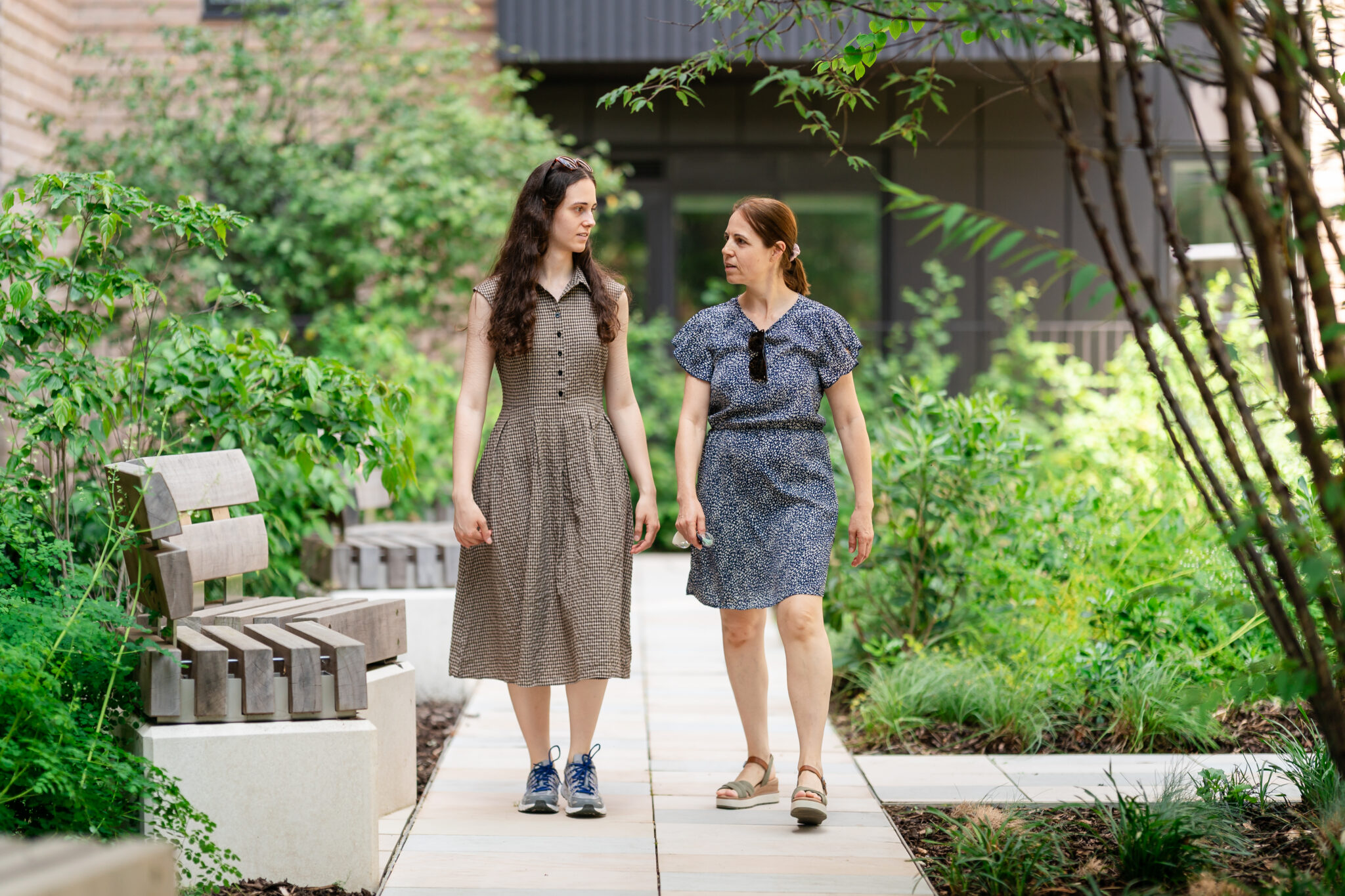 Vili and her daughter Elena walking in Alexandra gate garden